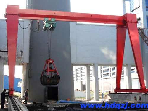 MHZ型電動(dòng)葫蘆門(mén)式起重機(jī)(抓斗) MHZ型電動(dòng)葫蘆門(mén)式起重機(jī)(抓斗)
